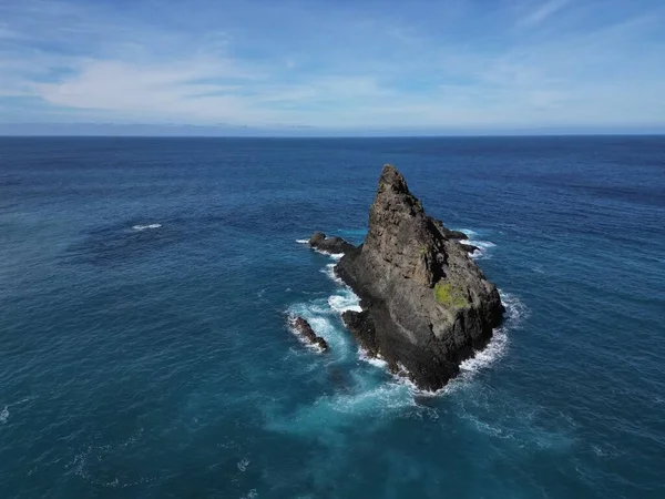 Aerial view of Madeira Island. Rocks in the ocean. Aerial view at cliffs in ocean on Madeira island, Portugal