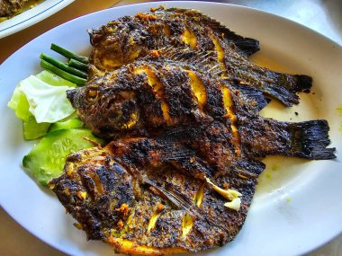 Tilapia balığı, tipik bir Bali balık yemeği.