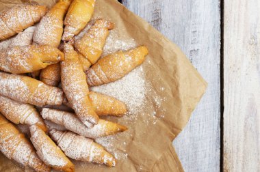 Perfect Croissant Breakfast in the morning. Rustic style. Top view. Mockup. Homemade cakes on a wooden background. Fragrant croissants. Baked goods croissant.
