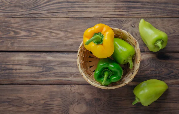 fresh green sweet (capsicum) pepper. Bell pepper or Capsicum annuum, also called sweet pepper or capsicum. Bell peppers are used in salads and in cooked dishes and are high in vitamin A and vitamin C.