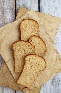 brown bread fresh and healthy food meal lunch dinner breakfast slices of bread flour snacks sandwich bread. Homemade bread, natural agricultural products. Healthy and tasty pastries.Whole grain bread