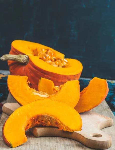 stock image Autumn fall pumpkin spice baking and drink ingredients. Various colorful pumpkins, nuts, seasonal spices. Cooking pumpkin pie, latte, cookies for autumn Thanksgiving holidays.Pumpkin on a wooden table