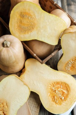 Big red pumpkin background, copy space, Orange  pumpkin , close-up.Pumpkin .Cooking seasonal food from pumpkin. Delicious healthy food. Organic.Autumn.Winter. Vitamins. Diet. Slimming. 