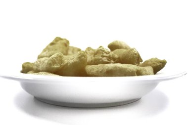 Dry batagor chips or crackers, a typical snack from Bandung, West Java, Indonesia, made from tapioca flour and mackerel.