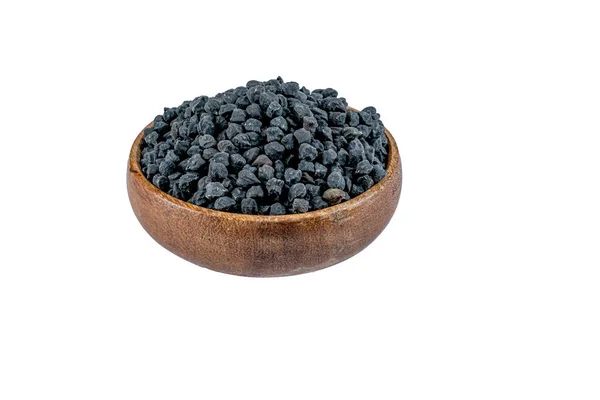 黑鹰嘴豆在木碗里 黑鹰嘴豆纤维含量高 吃起来很健康 — 图库照片