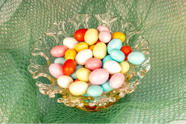 Almond candies.Colorful candies in glass bowl, almond sweets. Sugar Feast, (Feast of Ramadan) Ramadan concepts.
