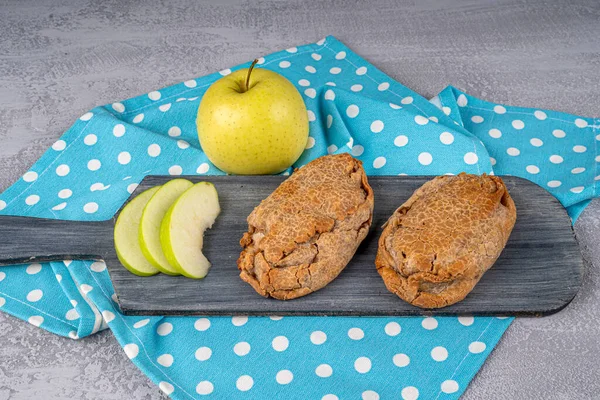 Gluten free food. Gluten free Apple Vegan Cookies made of buckwheat flour on wooden background from top view. Healthy and diet concept