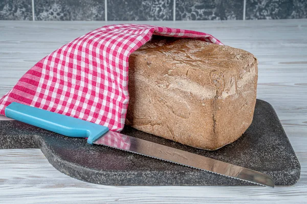 Gluten-free rectangular bread loaves. It is made with buckwheat flour, black cumin powder, gluten-free baking powder, water and salt. Gluten free food.