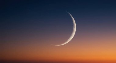 Witness the beauty of the crescent moon heralding Ramzan symbolizing peace and reflection in the night sky. clipart