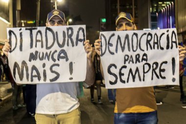 Sao Paulo, Brazil, January 09, 2023. Demonstrators perform an act in favor of democracy and protest against the terrorist followers of former president Jair Bolsonaro on Paulista Avenue