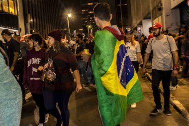 Sao Paulo, Brazil, January 09, 2023. Demonstrators perform an act in favor of democracy and protest against the terrorist followers of former president Jair Bolsonaro on Paulista Avenue