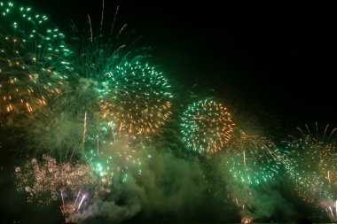 The firework isolated display for celebration happy new year and merry christmas on black isolated background in Brazil