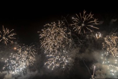 The firework isolated display for celebration happy new year and merry christmas on black isolated background in Brazil