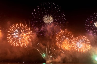 The firework isolated display for celebration happy new year and merry christmas on black isolated background in Brazil