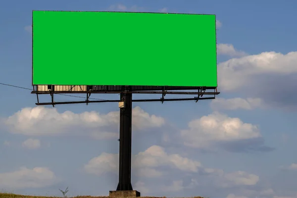 advertising sign with green background, spectacular billboard with chroma key in rural zone in Brazil