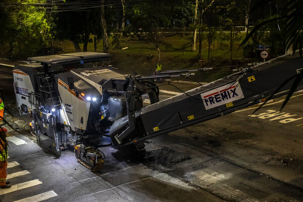 Sao Paulo, Brazil, September 24. 2023. Nighttime asphalt street resurfacing work, carried out by the City Hall, on a street Sao Paulo city