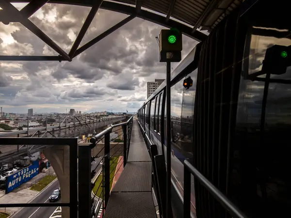 stock image Sao Paulo, Brazil,February 14, 2023. Train of the Light Vehicle on Rails, VLT system,  of line 15 silver arrives at the Oratorio Station in the east zone of Sao Paulo