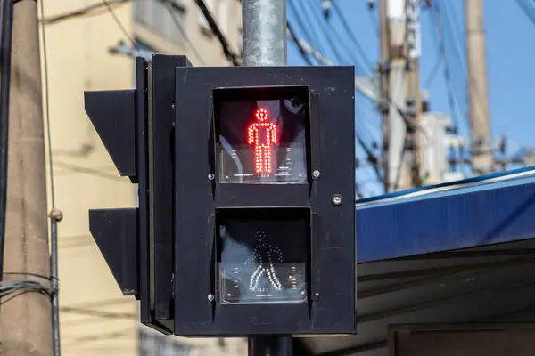 stock image Red stop traffic light, for pedestrians on the street in downtown of the city in Brazil