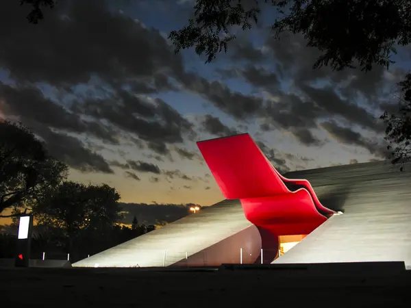 stock image Sao Paulo, Brazil. June 09, 2006: Night view of facade of the Ibirapuera Auditorium (Portuguese: Auditorio Ibirapuera) is a building conceived by Oscar Niemeyer, situated in Ibirapuera Park