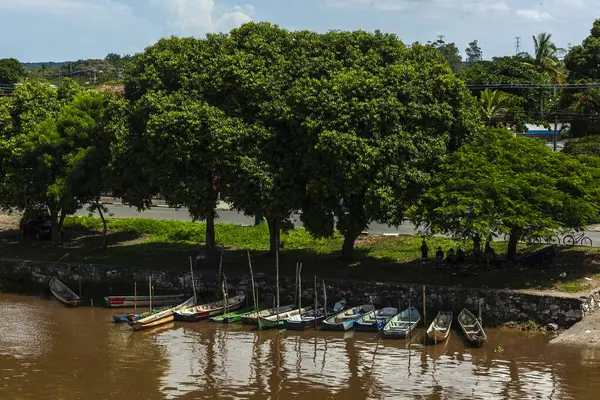 stock image Iguape, SP, Brazil, March 14, 2015. Small fishermen is boats and canoes anchored on the bank of the Ribeira do Iguape River, on the south coast of the state of Sao Paulo