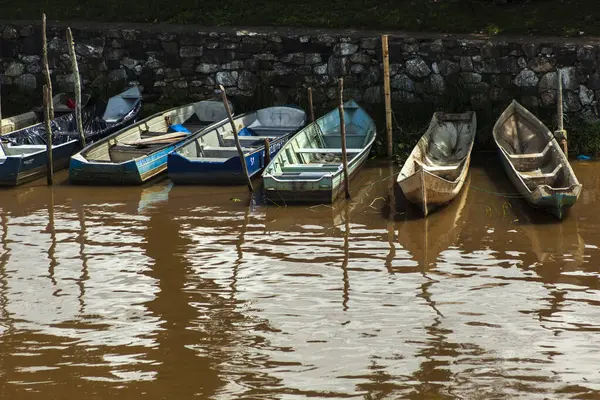 stock image Iguape, SP, Brazil, March 14, 2015. Small fishermen is boats and canoes anchored on the bank of the Ribeira do Iguape River, on the south coast of the state of Sao Paulo