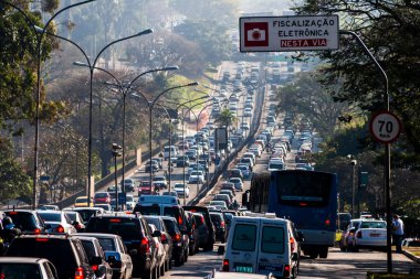 Sao Paulo, Brazil, August 12, 2011. Heavy traffic in the North South Corridor, at the 23 de Maio Avenue, south zone of Sao Paulo. This avenue connects the northern and southern areas of the city. clipart