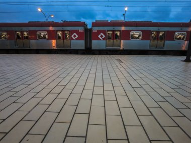 Santo Andre, Brazil, January 22, 2024. CPTM train on the boarding and disembarking platform at Utinga Station on Line 10Turquoise of the Sao Paulo metropolitan train company clipart