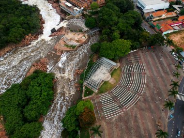 Salto, SP, Brazil, March 10, 2022. Drone view of the Arts Pavilion, the Acoustic Shell and the waterfall Tourist Complex, located on the banks of the Tiete River, in the tourist resort city of Salto clipart