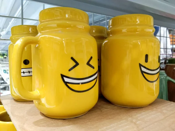 yellow ceramic cup with smile icon, very cute glass cup