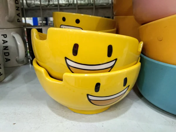 yellow ceramic bowl with smile icon, very cute bowl