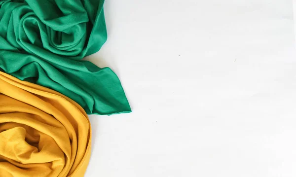 green and yellow fabric with negative space area, suitable for pamphlets