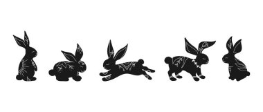 Farklı pozlarda tavşan siluetleri. Botanik elementlerle süslenmiş el yapımı tavşanlar. Vektör illüstrasyonu