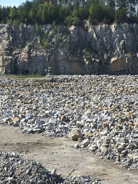 stock image a large pile of stones on the rocks of the river