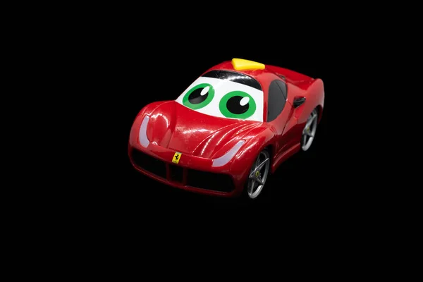 Tiny Red Plastic Sports Car Looking Someone Play — Stock Photo, Image