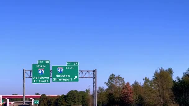 Direction Signs Highway Shreveport Houston Pov Driving Little Rock Usa — стоковое видео