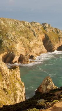 Cape Roca - Portekiz 'in ünlü Cabo da Roca sahili gün batımında - seyahat fotoğrafçılığı