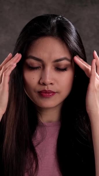 Young Woman Suffers Headache Studio Shooting — Stock Video