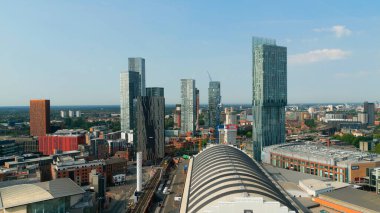 Flight over the city centre of Manchester - aerial view - MANCHESTER, UNITED KINGDOM - AUGUST 15, 2022