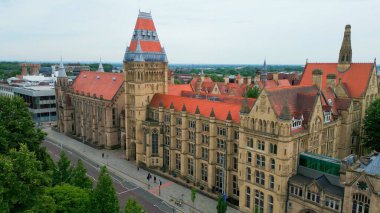 Museum of Manchester at the University Campus - aerial view - MANCHESTER, UNITED KINGDOM - AUGUST 15, 2022 clipart