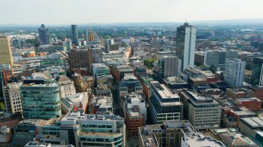 Flight over the city centre of Manchester - aerial view - MANCHESTER, UNITED KINGDOM - AUGUST 15, 2022