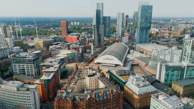 Flight over the city centre of Manchester - aerial view - MANCHESTER, UNITED KINGDOM - AUGUST 15, 2022