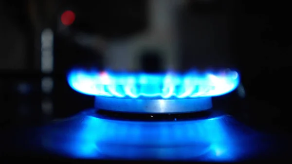 The flame of a gas stove in the kitchen - travel photography