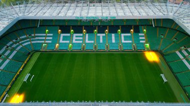 Celtic Stadium in Glasgow the home of FC Celtic Glasgow - aerial view - GLASGOW, UNITED KINGDOM - OCTOBER 04, 2022 clipart