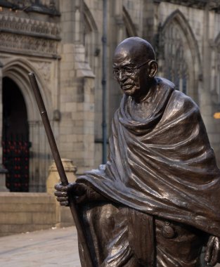 Mahatma Gandhi statue in the city of Manchester - MANCHESTER, UNITED KINGDOM - AUGUST 15, 2022