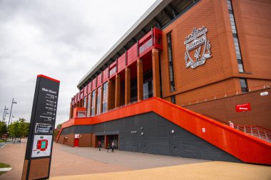 FC Liverpool Logo on the wall of Anfield stadium - LIVERPOOL, UNITED KINGDOM - AUGUST 16, 2022