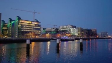 Beautiful Dublin with River Liffey by night - CITY OF DUBLIN, IRELAND - APRIL 20, 2022