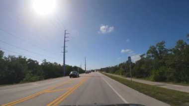 POV Drive on the Overseas highway at the Florida Keys - KEY WEST, USA - FEBRUARY 15, 2022