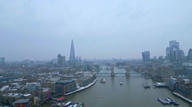 River Thames in London in the mist on a foggy day - LONDON, UNITED KINGDOM - DECEMBER 18, 2022