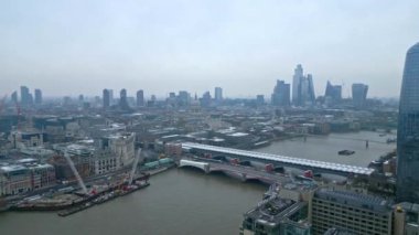River Thames in London in the mist on a foggy day - LONDON, UNITED KINGDOM - DECEMBER 18, 2022