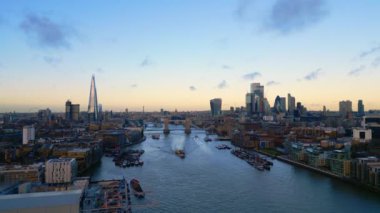 Aerial view over Tower Bridge and the city of London - LONDON, UNITED KINGDOM - DECEMBER 18, 2022